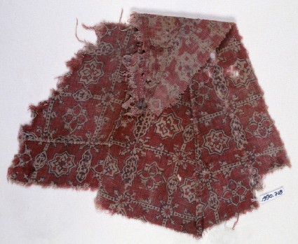Textile fragment with quatrefoils and stars, probably from a garmentfront