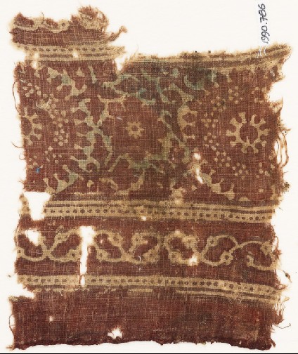 Textile fragment with rosettes, leaves, and stemsfront