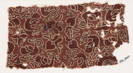 Textile fragment with hamsa, or geese, and quatrefoilsfront
