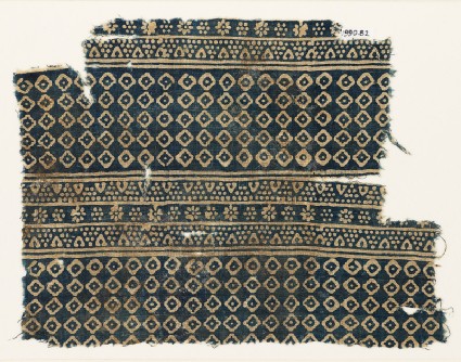 Textile fragment with diamond-shapes, lobed squares, and dotsfront