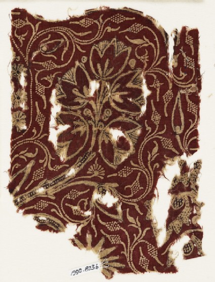 Textile fragment with flowering treesfront