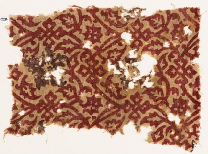 Textile fragment with interlacing tendrils, leaves, and flowersfront