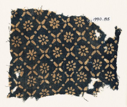 Textile fragment with flowers, dots, and rosettesfront