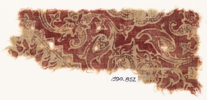 Textile fragment with swirling tendrils and flower-headsfront