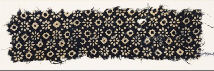Textile fragment with rosettes, dots, and lobed diamond-shapesfront