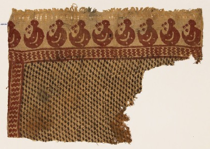 Textile fragment with S-shapes and crescentsfront