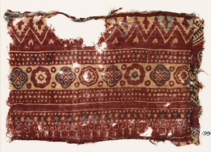 Textile fragment with bands of quatrefoils, rosettes, and chevronsfront