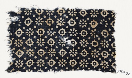 Textile fragment with rosettes, dots, and lobed squaresfront