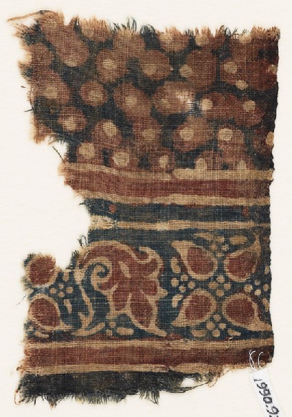 Textile fragment with leaves and dotsfront