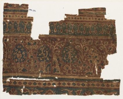 Textile fragment with flowering treesfront