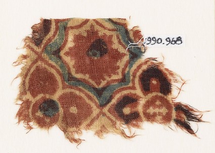 Textile fragment with linked quatrefoilsfront