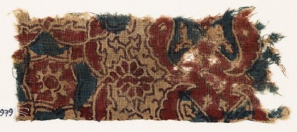 Textile fragment with medallion, wings, and rosettesfront