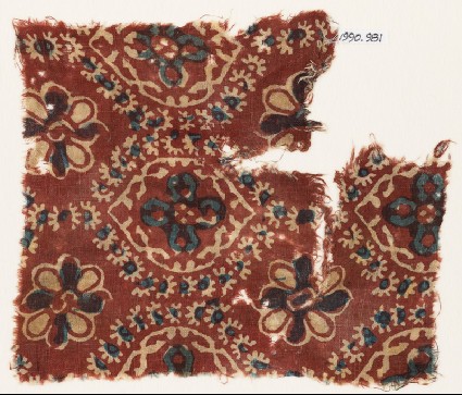 Textile fragment with pointed ovals and rosettesfront