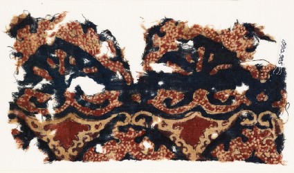 Textile fragment with tendrils and possibly leavesfront