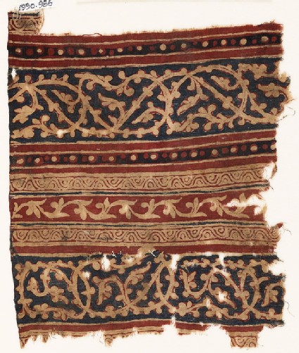 Textile fragment with bands of interlacing tendrilsfront
