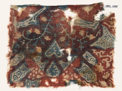 Textile fragment with tendrils, hearts, and tab-shapesfront
