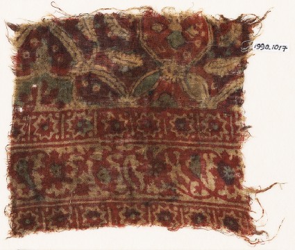 Textile fragment with stars, interlace, and possibly linked medallionsfront