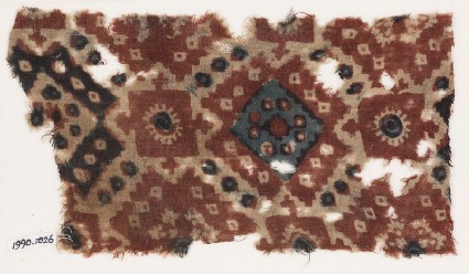 Textile fragment probably imitating patola pattern, with diamond-shapes and squaresfront