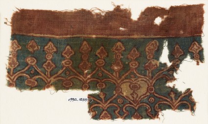 Textile fragment with linked hearts and archesfront
