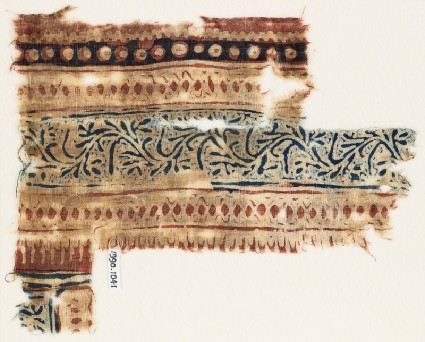 Textile fragment with vine and dotsfront