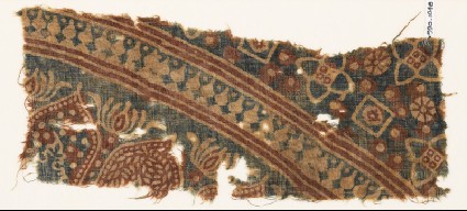 Textile fragment with arches and stylized treesfront