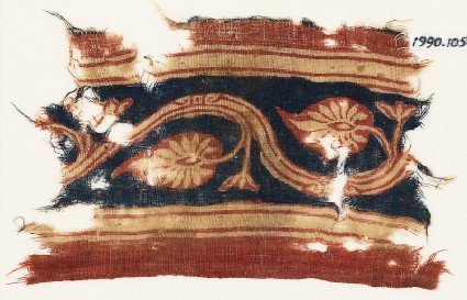 Textile fragment with vine and palmettesfront