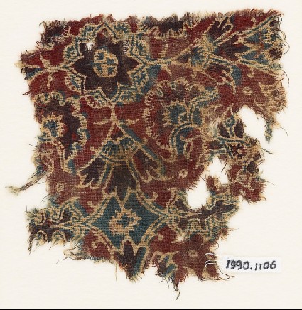 Textile fragment with elaborate flowersfront