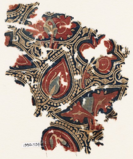 Textile fragment with stylized leaves or treesfront