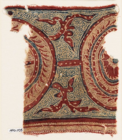 Textile fragment with two linked medallions and tendrilsfront