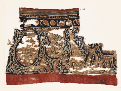 Textile fragment with stylized leavesfront