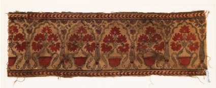 Textile fragment with flowers in potsfront