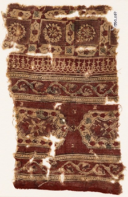 Textile fragment with elongated hexagons, vines, and linked squaresfront