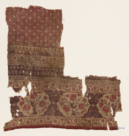 Textile fragment with flower bushesfront