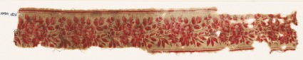 Textile fragment with naturalistic linked flowersfront