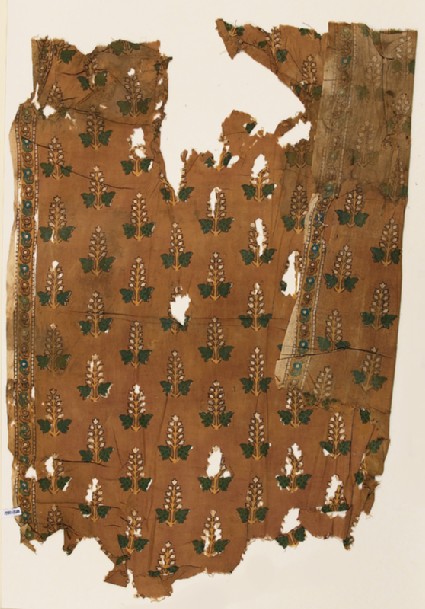 Textile fragment with stylized plantsfront