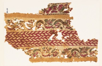 Textile fragment with bands of linked flowers and leavesfront