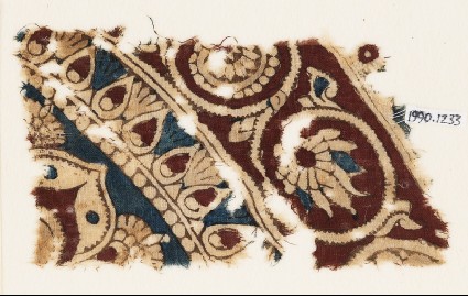 Textile fragment with bands of flower-heads, tendrils, and vinesfront