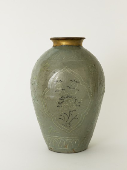 Greenware vase with floral decorationside