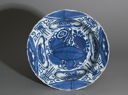 Blue-and-white kraak style bowl with banana leaf and flowerstop