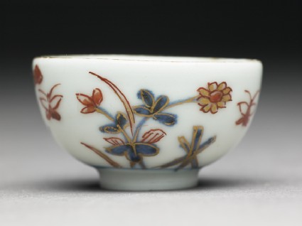 Miniature cup with flowers and butterfliesside