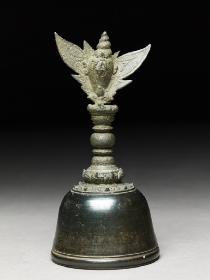 Bronze handbell with winged conch finialside