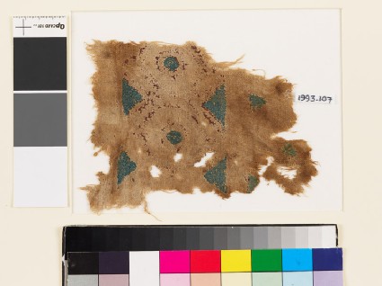 Textile fragment with linked hexagons, circles, and trianglesfront