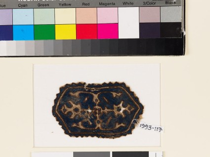 Textile fragment with hexagon, two palmettes, and leavesfront