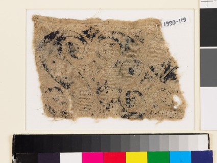Textile fragment with foliate S-shapes and palmettesfront