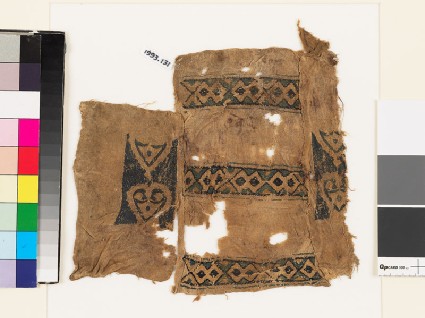 Textile fragment with bands of diamond-shapes and heartsfront