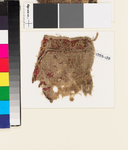 Textile fragment with scrolling stem, probably from a tabfront