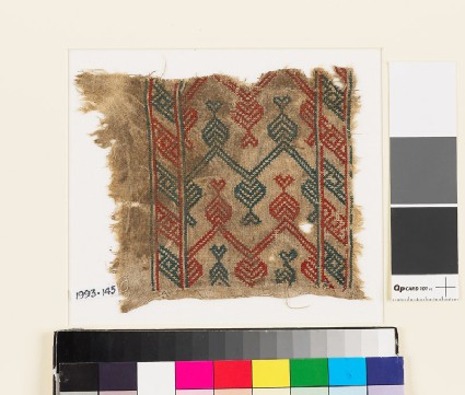 Textile fragment with hearts, V-shapes, and chevronsfront