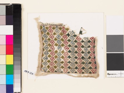 Textile fragment with linked rosettes and leavesfront