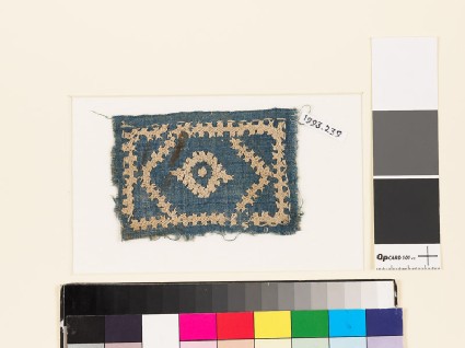 Textile fragment with diamond-shape, hexagon, rectangle, and linked crossesfront