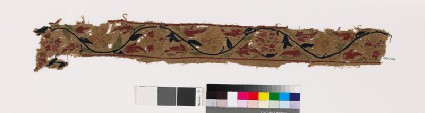 Textile fragment with flowers, leaves, and stemfront
